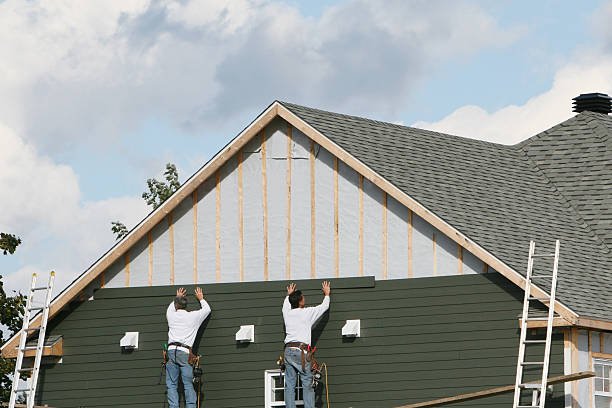 Professional Siding technician working in Bedford, TX